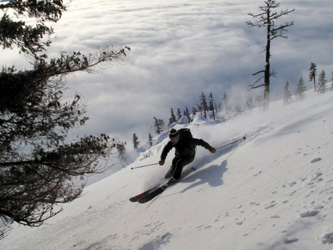 A skier manages to stay on top, or at least near the top, of a breakable crust layer on Twin Peaks in Washington State. Photo: Andy Dappen