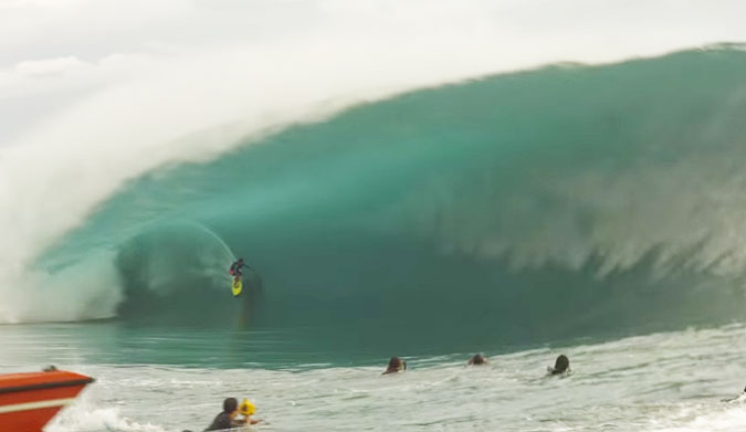 One can only imagine what's going through his head during those waves–but we're pretty sure it's something along the lines of what the screaming banshee on the boat is doing.