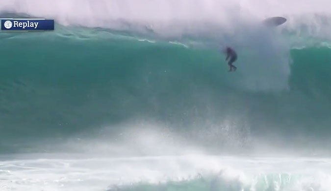 Kelly Slater pulled he pin, covered his vitals and took it on the chin, just like he's done a thousand times before... but it's rare to see it.
