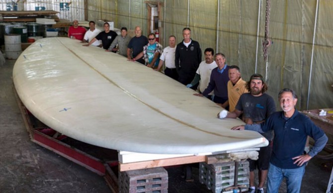"Hey man, just stopping by to see if my board's ready. You said 5-7 weeks." The crew that took on one heck of an order card. Photo: OCRegister/Ed Crisostomo