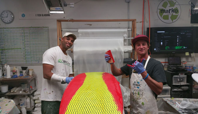Alex Gray glassing his own ecoboard at E-Tech with Ryan Harris.