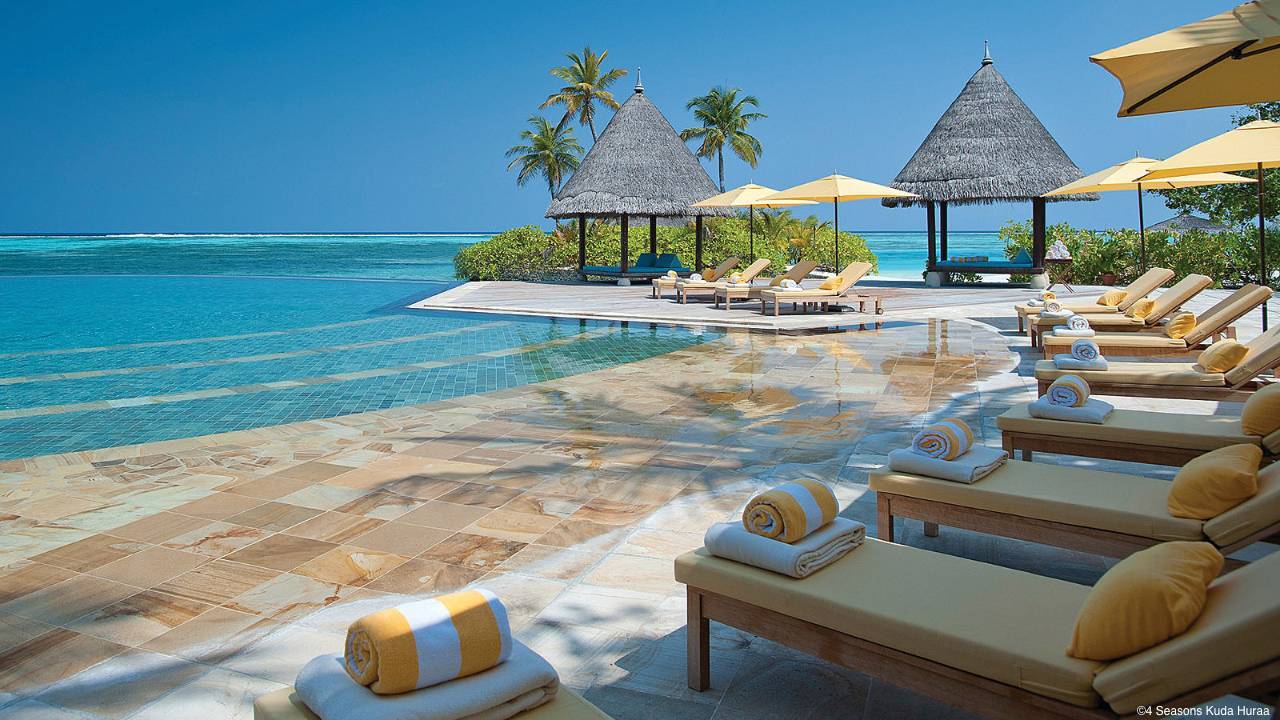4 Seasons Kuda Huraa in the Maldives ticks all the family surf trip boxes.