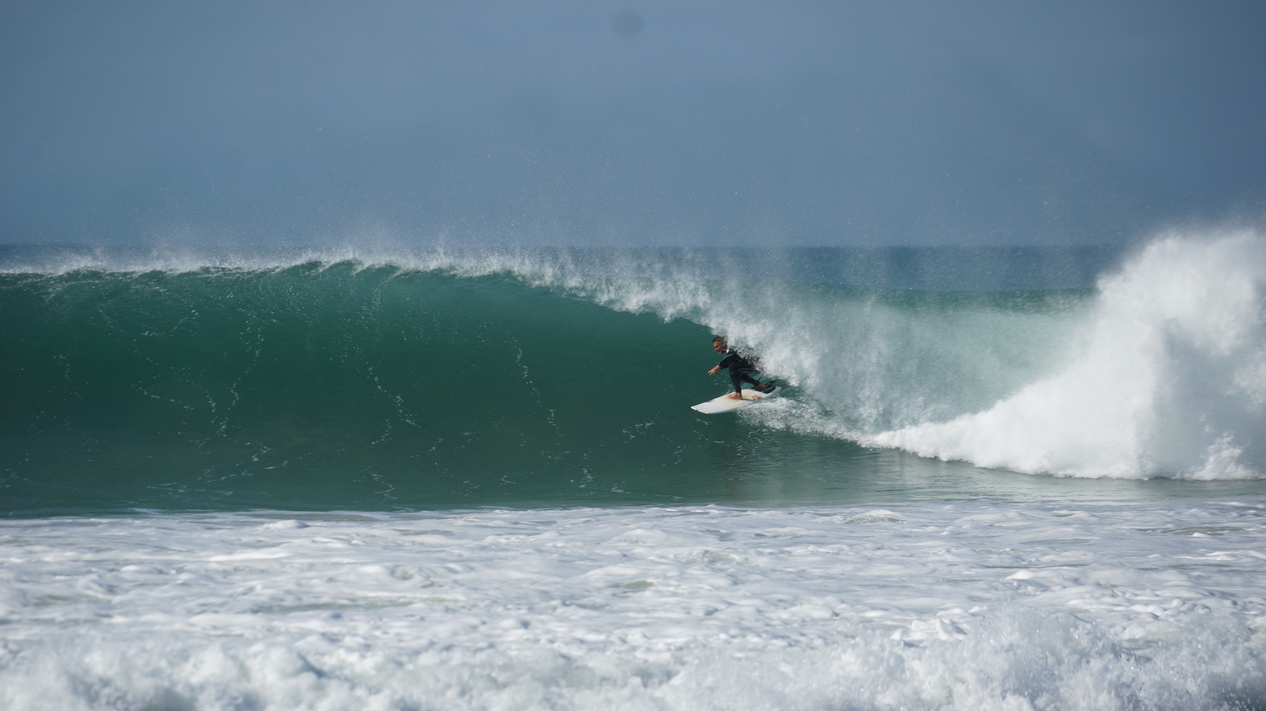 LUEX'S CEO Tim getting barreled on a family trip to J-Bay
