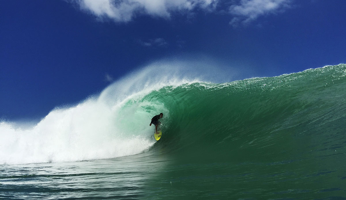 Never before have I got on a plane to chase a swell with nothing but my phone.
