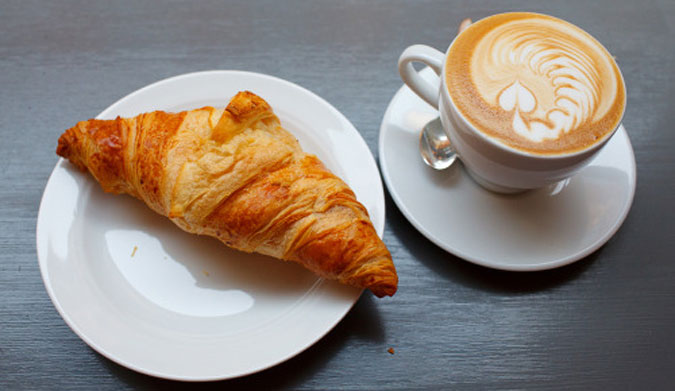 Yummy croissant and coffee. Photo: Adam Goldberg / Flickr