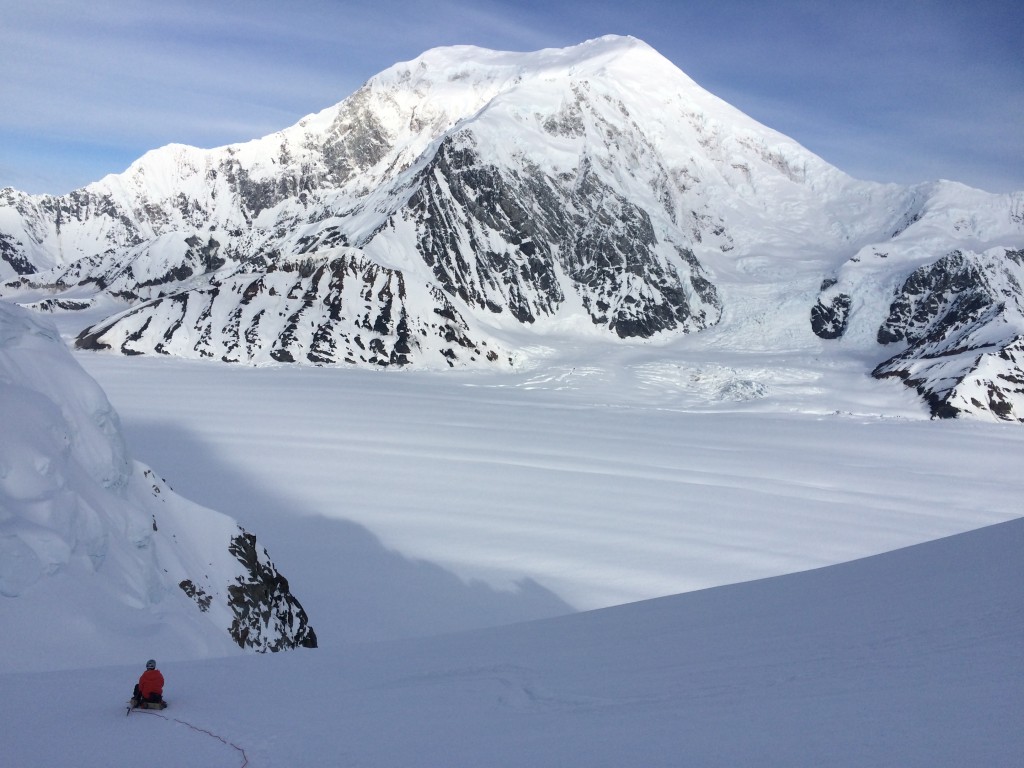 Peter contemplates the enormity of Mt. Foraker and the Alaska Range from beneath the Cat’s Ears on Mt. Hunter.