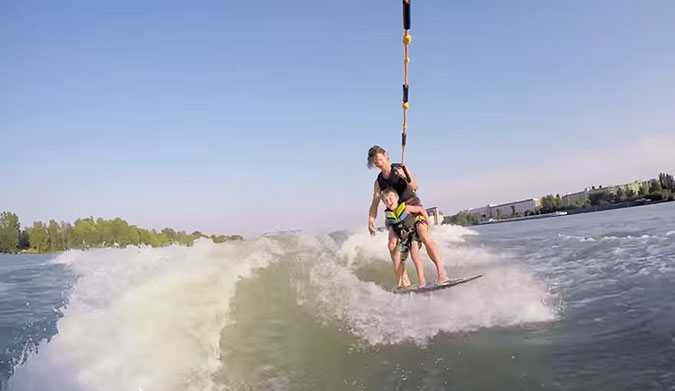 Father and son wakesurf