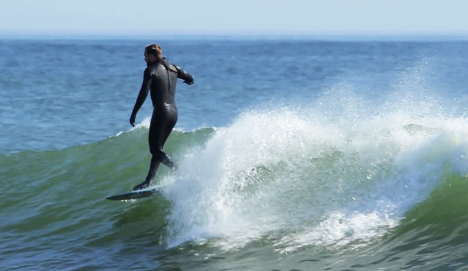 After doctors told him he would never be able to surf again, he simply started surfing again.