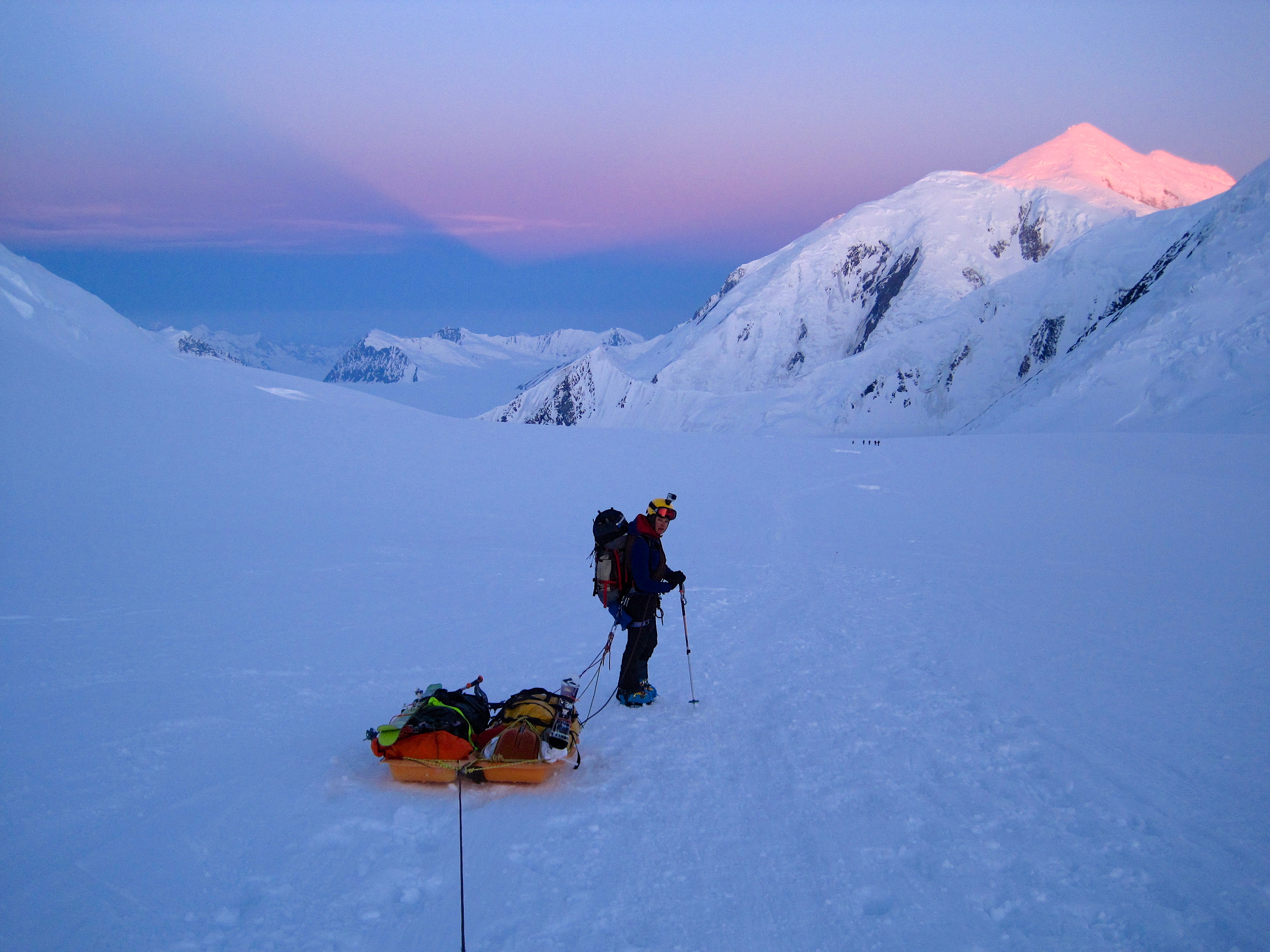These sleds became a constant, yet quite unwelcome, companion during our time on the lower mountain. Here, some creative rigging allowed for this double-wide trailer-style on the way down from 11k camp. Photo credit: David Leonard