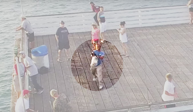 This fisherman on the San Diego pier didn't take kindly to the intrusion on the sanctity of his fishing time.