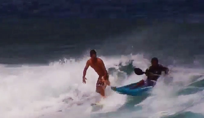 If you've ever been burned by a surf kayaker, well, this is the best thing you can possibly do. Surf the surf kayaker.