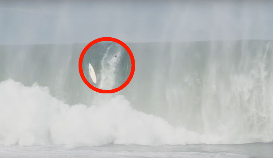 Imagine you're Pedro Calado, scratching as hard as you can for a horizon darkened by a looming, massive wave.
