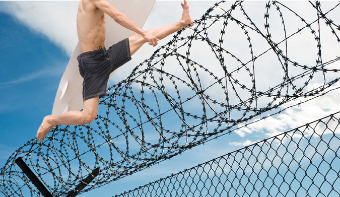 If you are going to escape for a luxurious island prison, the coolest way you can possibly do it with on a surfboard with a little plastic shovel.