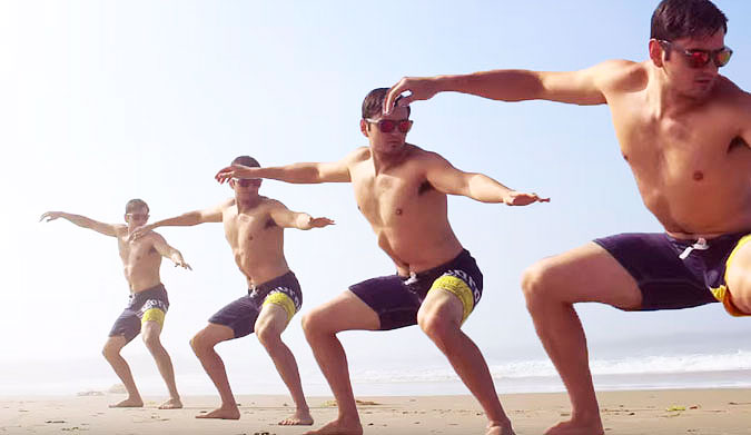 He's just standing on the beach in a stink bug pose.