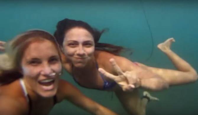 Here are two students that are clearly stoked to be surfing and earning college credit at once.
