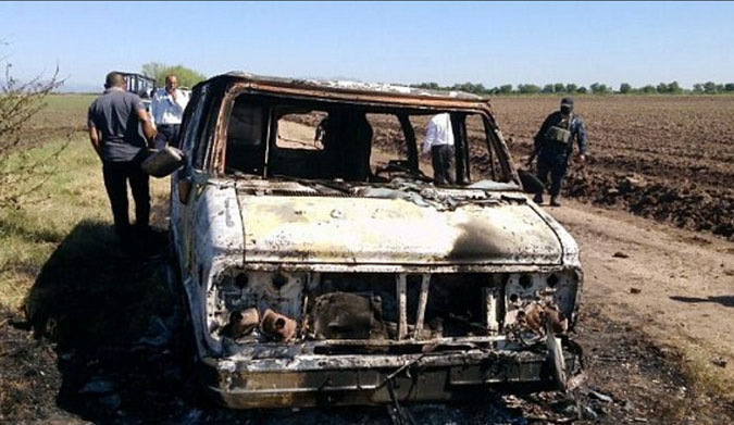 The bodies of two men were found in a burned van in Mexico.
