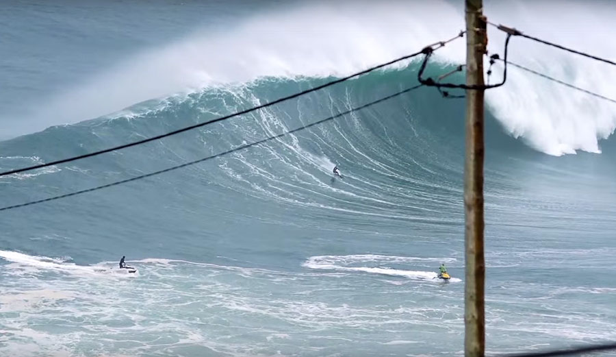 Filmed from a different angle than we're used to seeing at Nazaré, it show just how big, long, and powerful the wave really is.