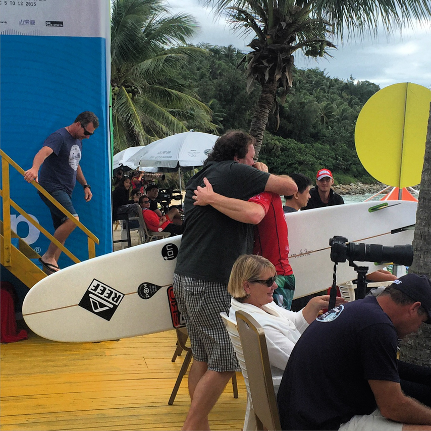 A father's proud embrace.