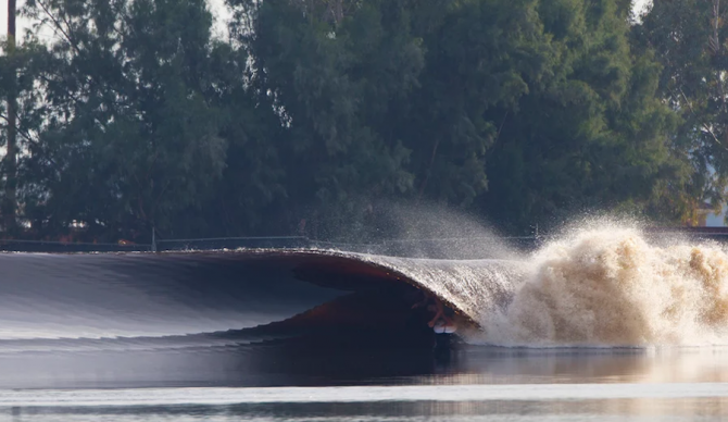 Not a drop of water out of place. Kelly Slater drives through perfection. Photo: Kelly Slater Wave Co