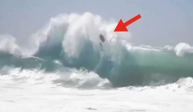 Backwash can be pretty fun to mess around in–to a point, at least. One has to imagine that this guy is not having all that much fun, though.