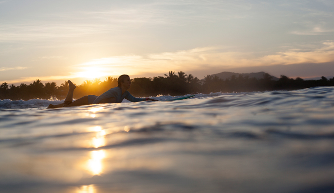 Sunrise session to start the day! With mountains and palm trees the view is not too shabby! Photo Courtesy of Two Feet and Classy
