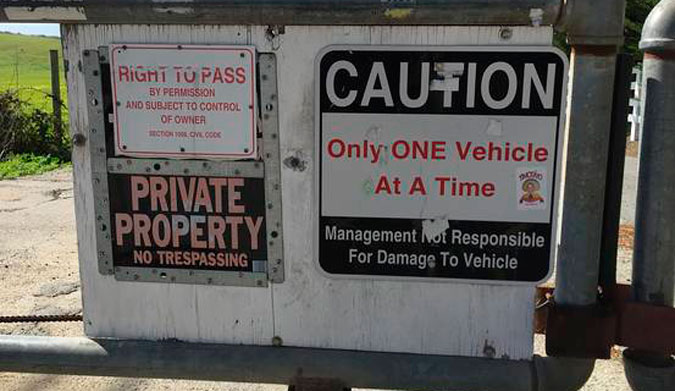 In 2015, the San Mateo County sheriff’s office released a statement that it will not be making arrests or issuing citations for trespass at Martin’s Beach, even though there are “No Trespassing” signs on the property. Photo: Georgia Wells for The Wall Street Journal