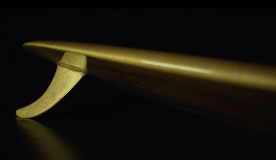 Called the Aureus after Rome's golden coin, the surfboard looks like it's some kind of '70s shape.