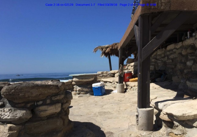 The shack in question. And a view very few outsiders have enjoyed. Image: Exhibit in the Complaint.