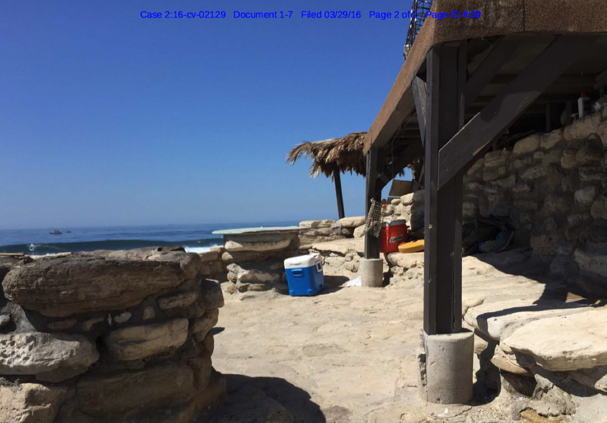 The shack in question. And a view very few outsiders have enjoyed. Image: Exhibit in the Complaint.