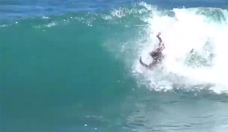 Dolphins are just on a different level. Then there's this guy, who's spinning around like a maniac, getting tubed, and spinning some more.