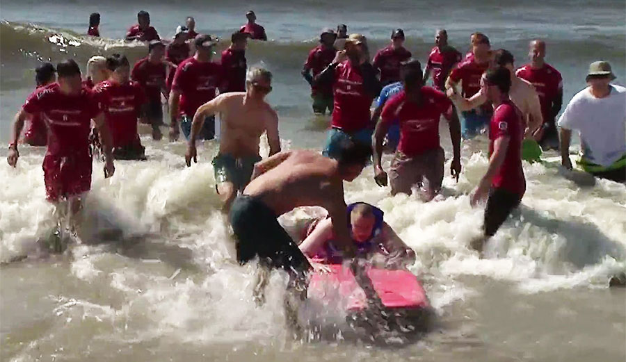 Hundreds of volunteers showed up for “They Will Surf Again" to lend a hand, and almost $10,000 was raised for the participants.
