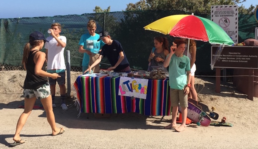 The Latigroms hawking their wares. All for a good cause.