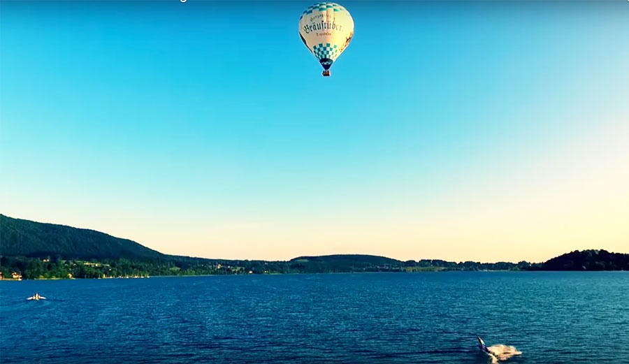 Carsten Kurmis went surfing under a hot air balloon.