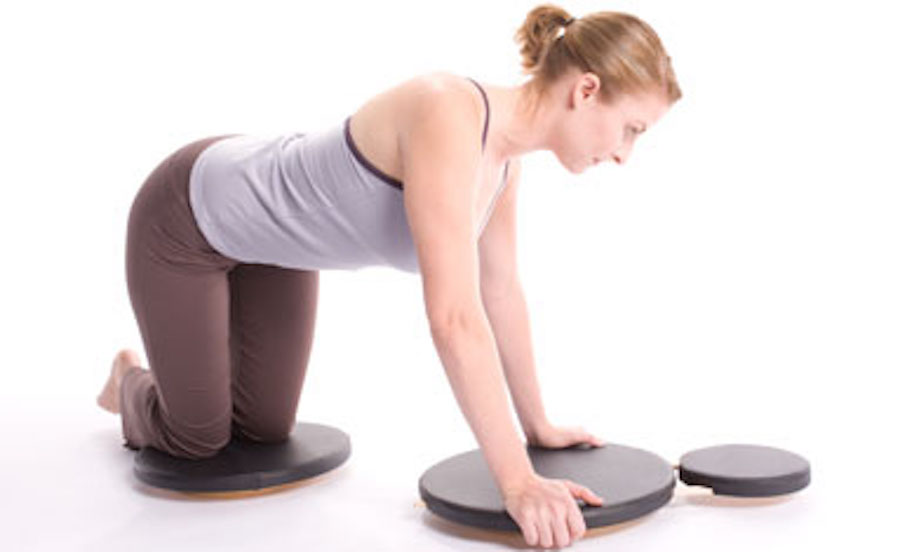 Popular for Pilates, rotator discs are a great option to build core strength at home. Photo: Little Bantam Trainer