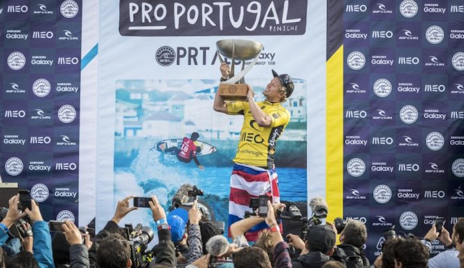 John John raises the world title trophy in Portugal – the fourth Hawaiian ever to do so. Photo: WSL/Poullenot/Aquashot