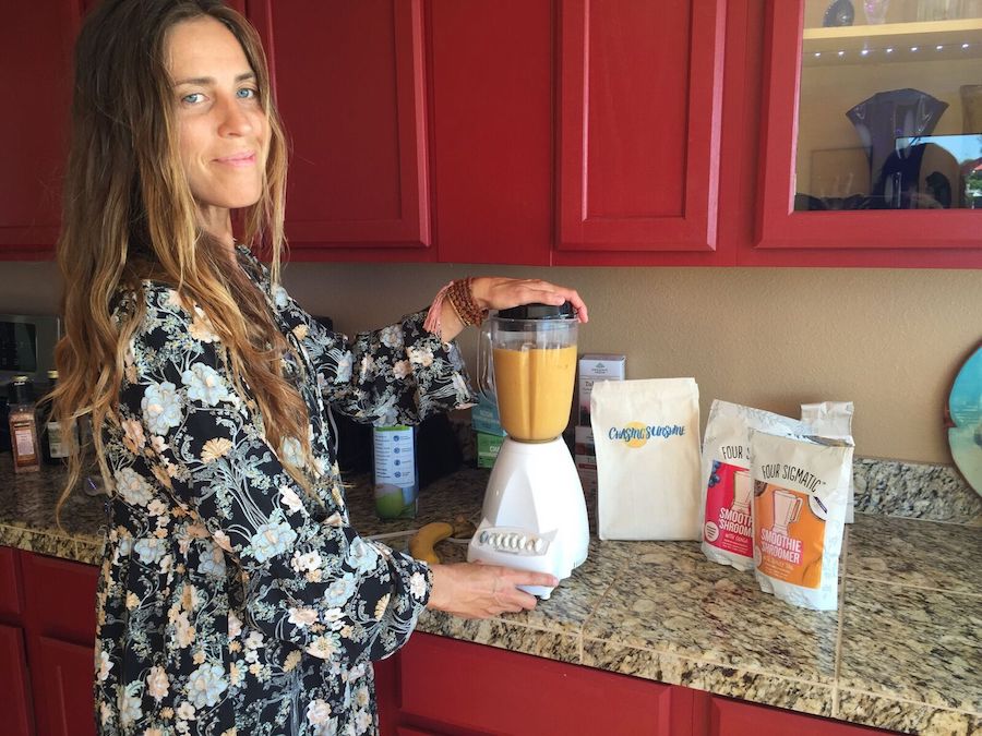Megan mixes up a smoothie at B4BC's recent Chasing Sunshine Ocean Side Retreat. Photo: B4BC