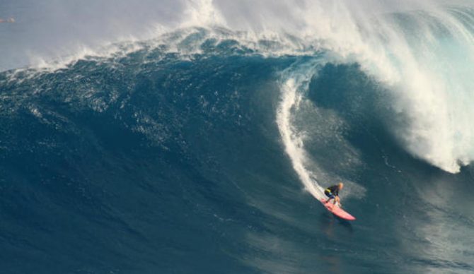 Perennial female big wave charger, who also just so happens to be in an openly gay biracial relationship, KK's ability to do it for the love all costs is the inspiration we need right now. Photo: WSL/Aaron Lynton