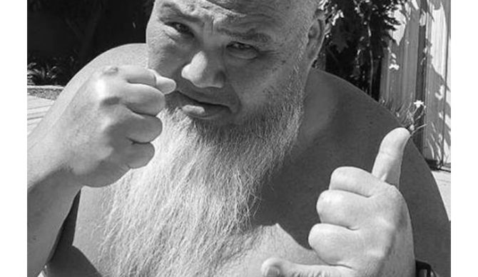The two sides of Sumo: throwing punches to cancer, throwing shakas to everyone else. Photo: Cobian
