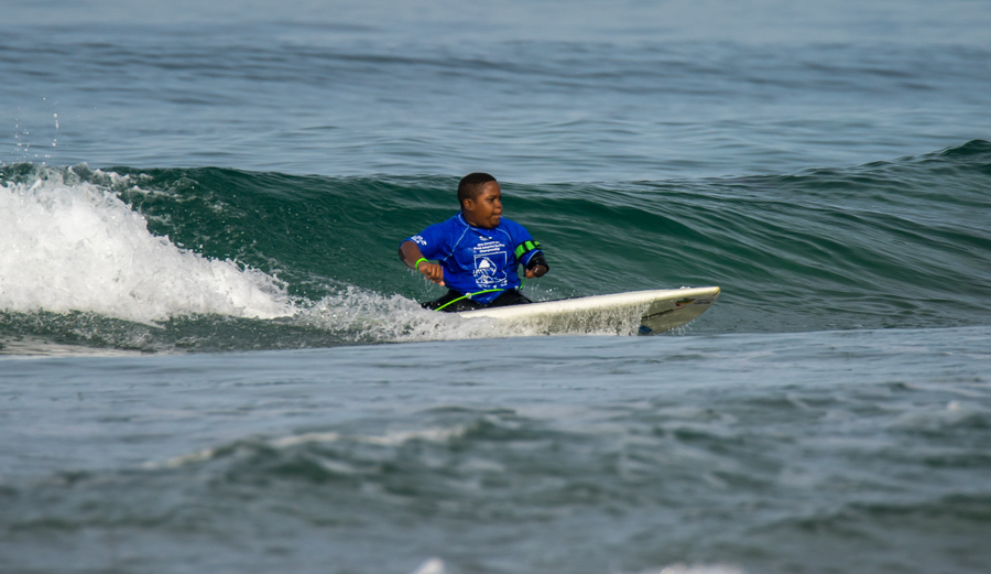 11-year-old Freddy Marimon from Colombia surfing in Heat 3 of the AS-5 Assist Division. Photo: ISA/Sean Evans