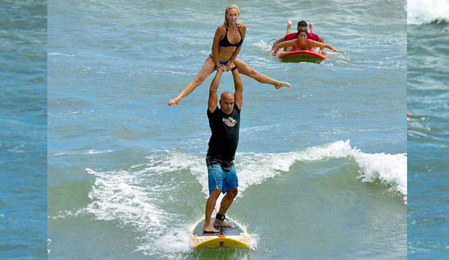 Ed Martinez and his wife tandem surfing and political champs. Photo: @tandemsurfing