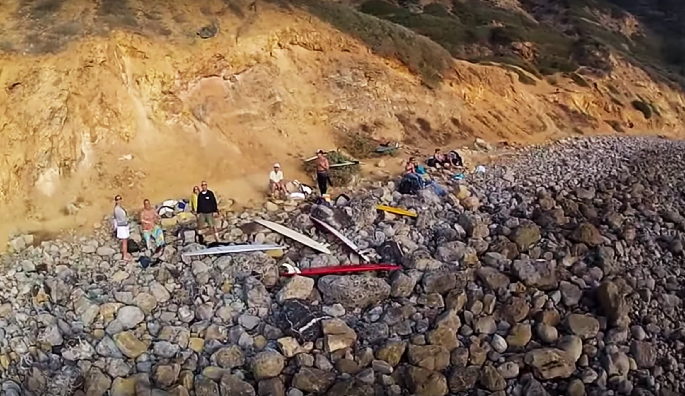 The scene at Lunada Beach as shot by a drone. Seconds later a rock was thrown at this drone. Image: Youtube