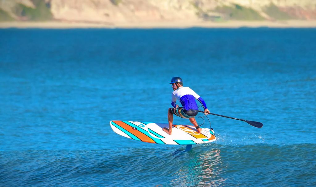 If there are three things in the surf world that get core surfers (whatever core means) upset, they're stand-up paddling, hydro foiling, and Laird Hamilton.