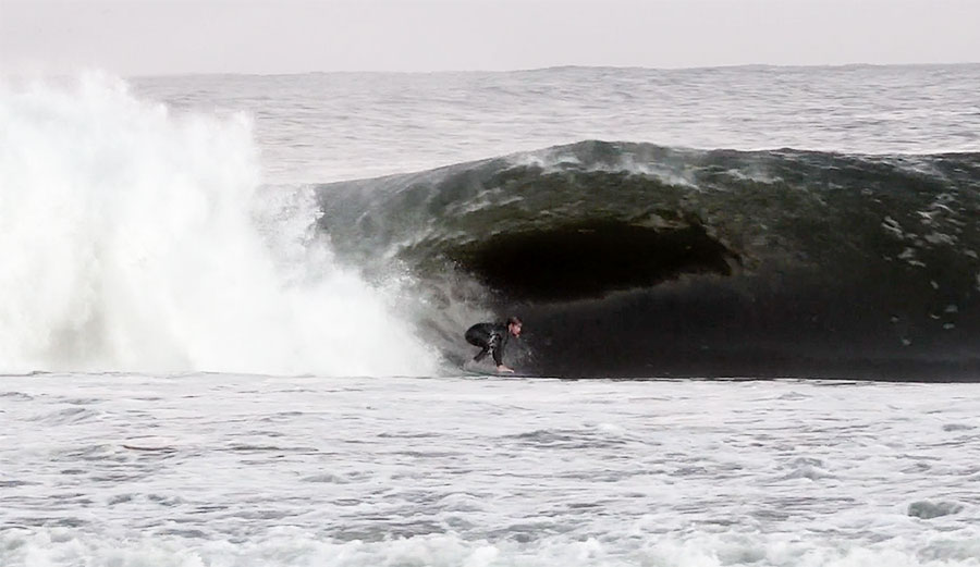 It's Namibia, and you are there to surf exceedingly long barrels and hope you escape unharmed.