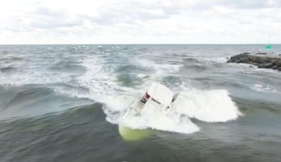 After a man's boat sank in Jupiter Inlet, a 13-year-old surfer came to the rescue.