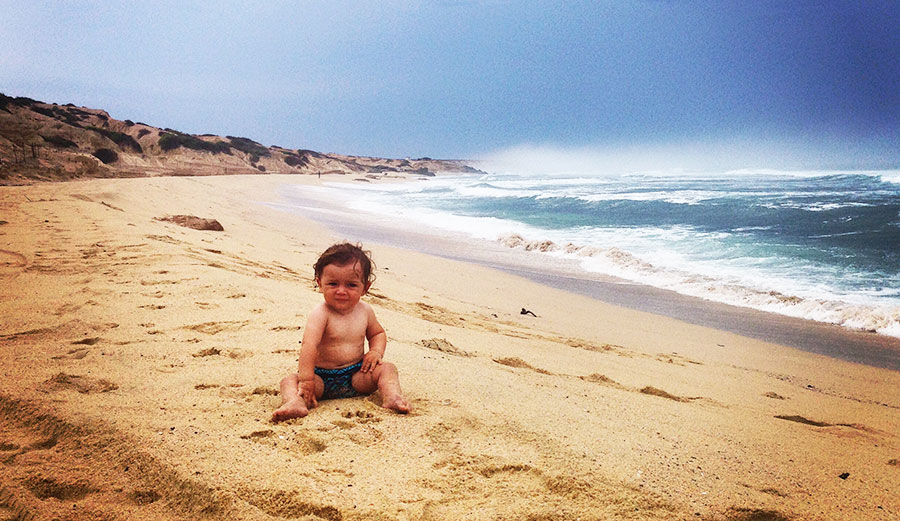 A baby isn't the end of your surf trips. It's just the beginning of different ones.