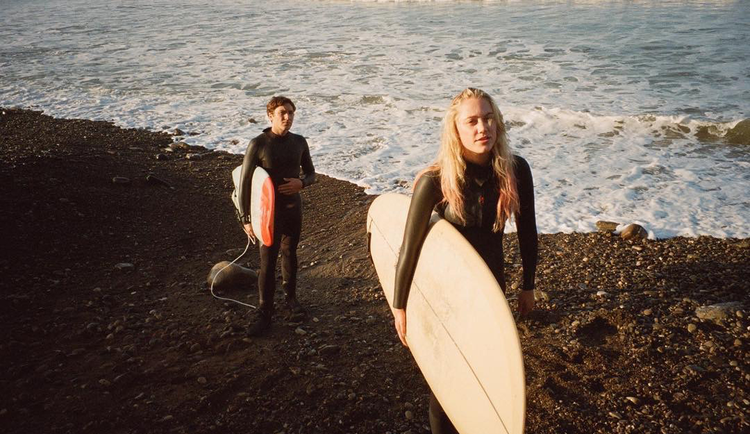 Maika Monroe and Cody Fern play twins adjusting to surf life after moving to a private community in Los Angeles from Michigan. Image: The Tribes of Palos Verdes