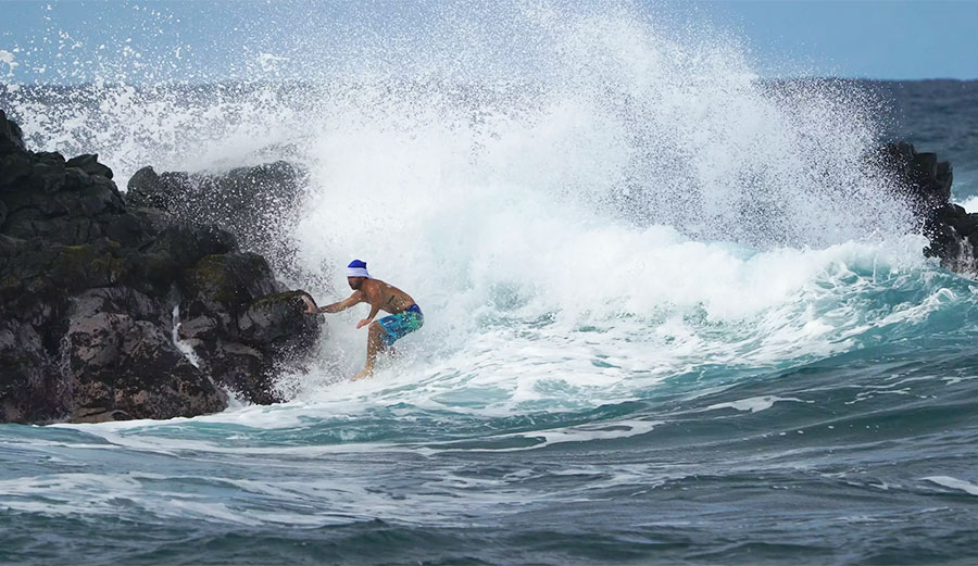 Mason Ho surfs in places where most wouldn't consider surfing. He bounces off rocks like a basketball on a trampoline. He laughs in the face of cliff faces.