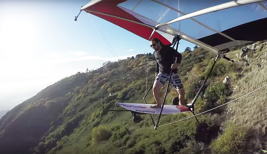 Wolfgang Siess is one of the best hang glider pilots in the world.  That's why he strapped a surfboard to one.