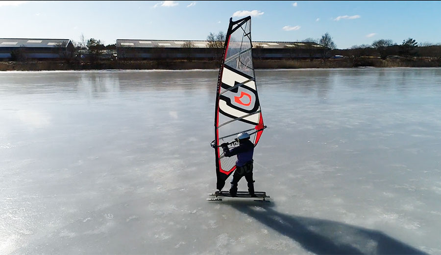 Shot in Sweden, it's a mix of skateboarding, ice skating, and windsurfing. And whatever you call it, it looks like a blast.