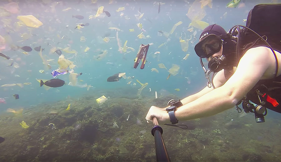 When a scuba diver went diving in Indonesia, he found a massive swirling pile of floating trash.